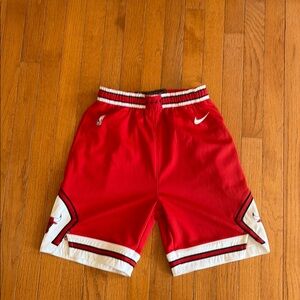Boys official Chicago Bulls shorts. Size L Nike. Minor pen mark on front (pic)